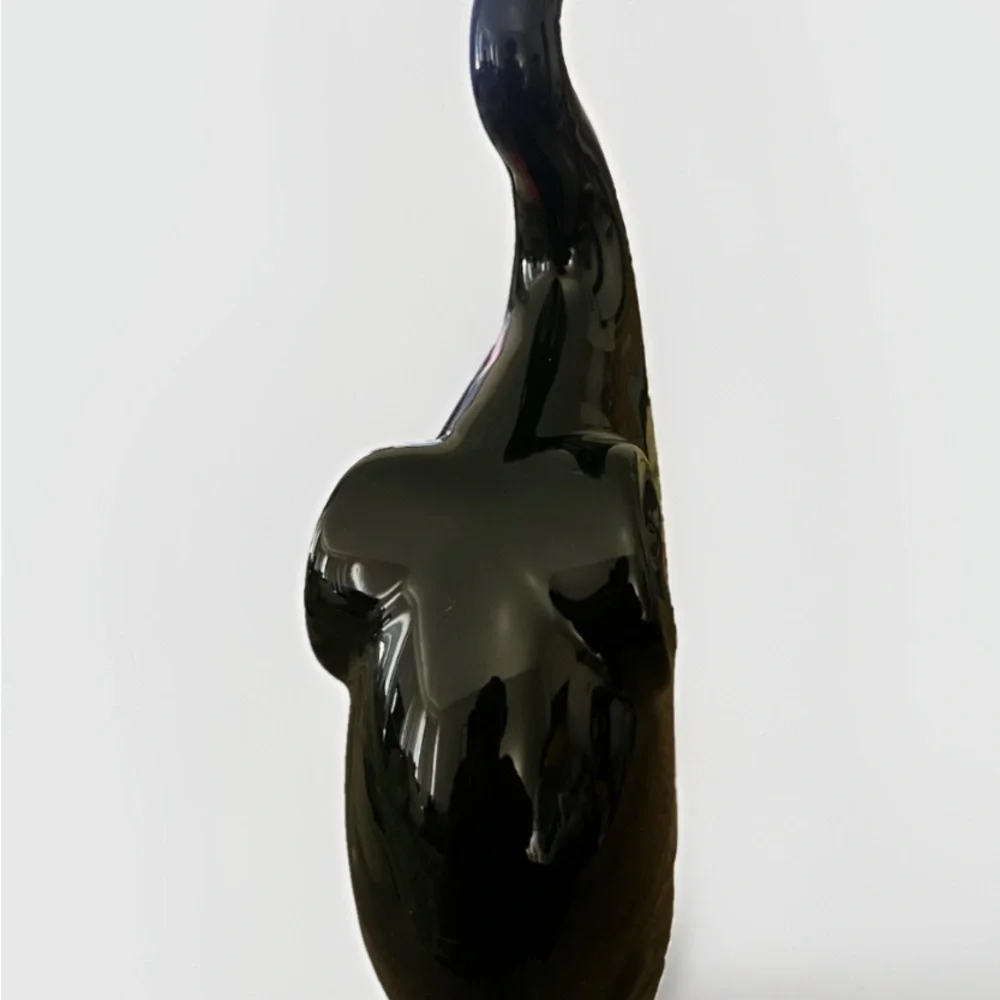 Elegant Black and Red Elephant Sculptures